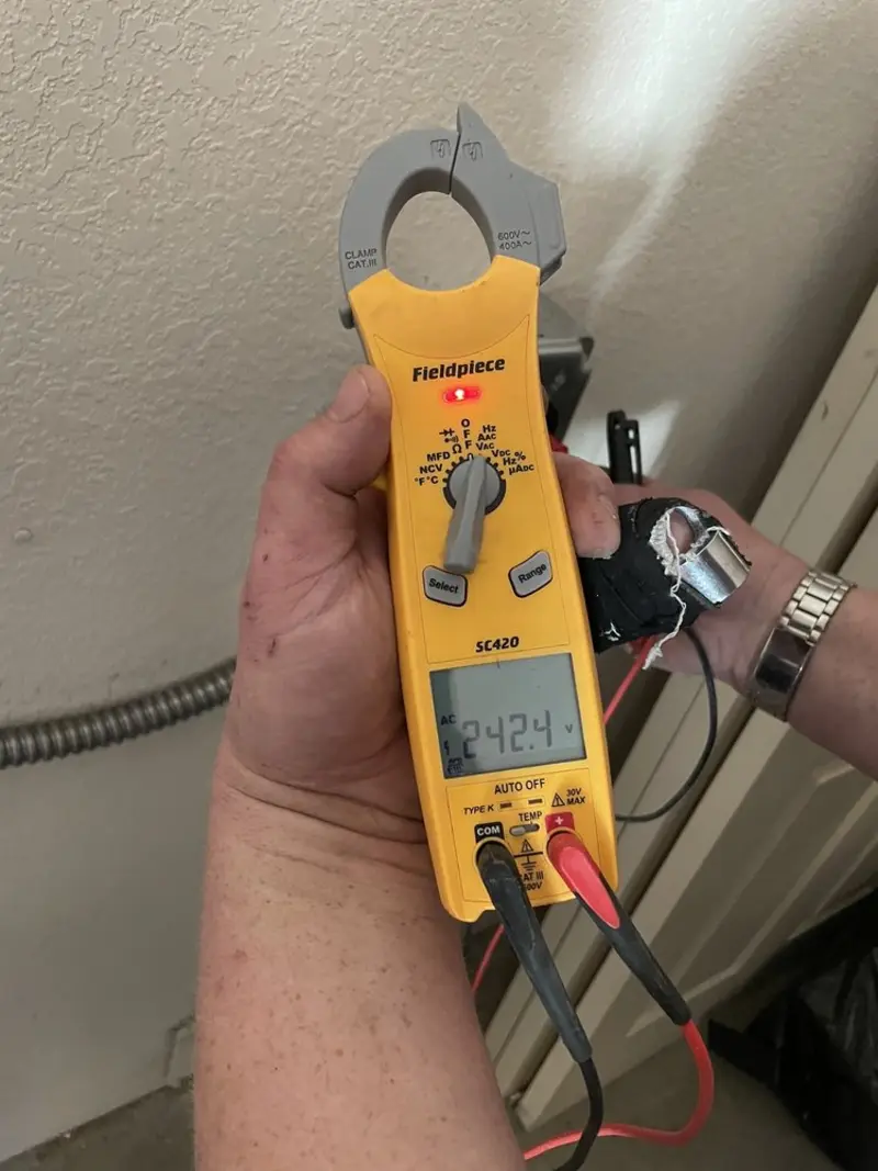 Voltage testing with clamp meter during Circuit Breaker Repair in Sparks